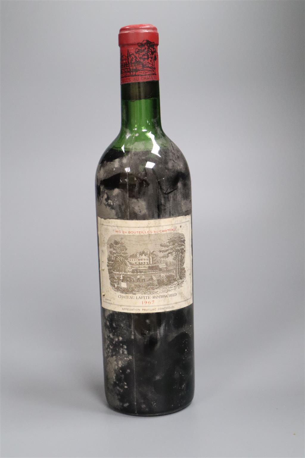 A bottle of Chateau Lafite-Rothschild, 1967, mid to top shoulder